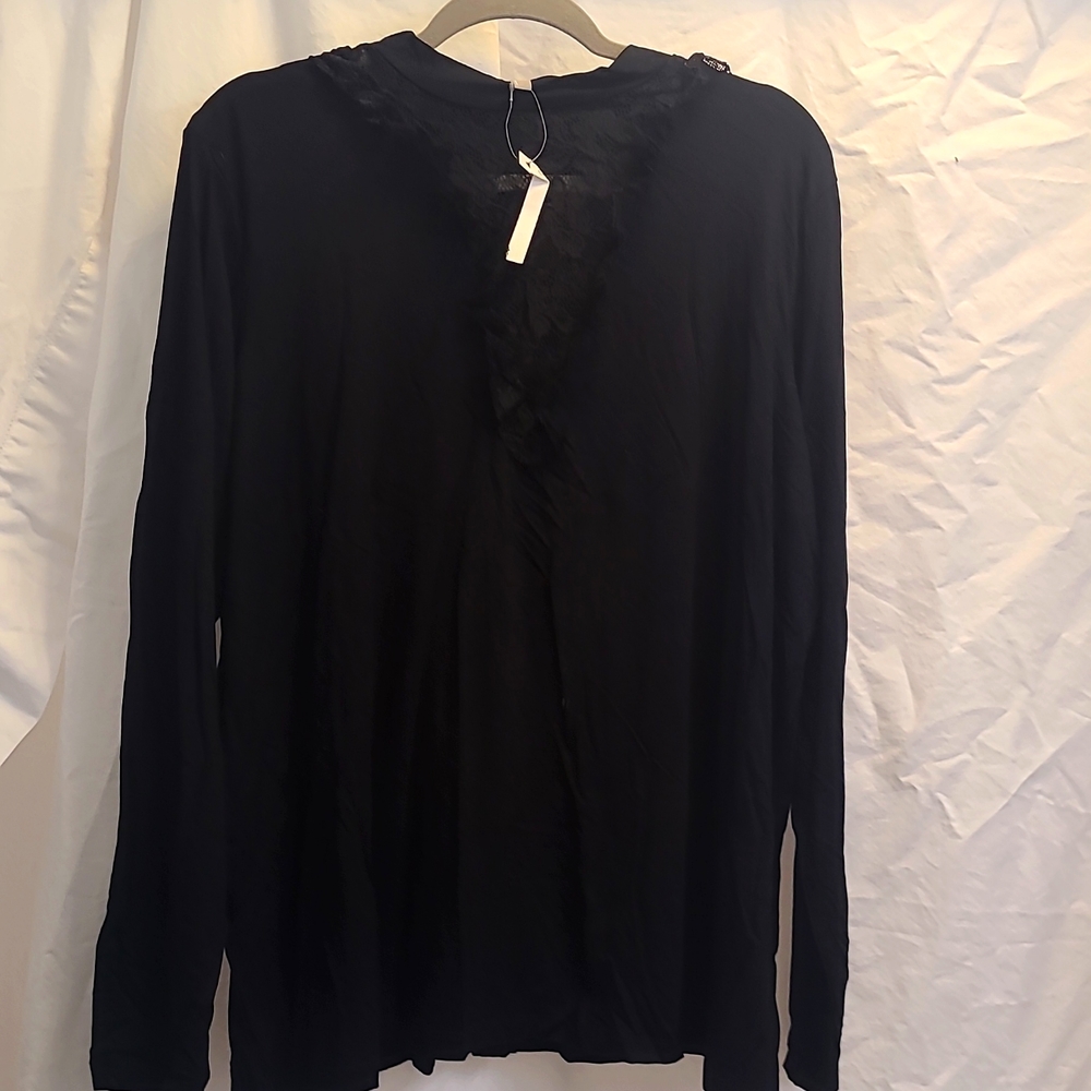 Never worn black long sleeve tee with inset lace v at neck. Stretchy fabric.
